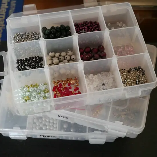 3x small containers of beads