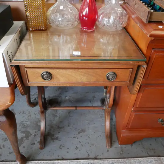 mahogany dropside end table with glass top and single drawer