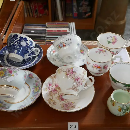 various cups, saucers, small creamer