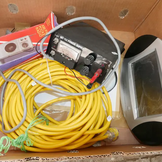 box; alarm clock, power supply, extension cord etc