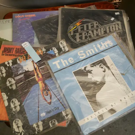 stack of LPs; The Smiths, Def Leppard etc