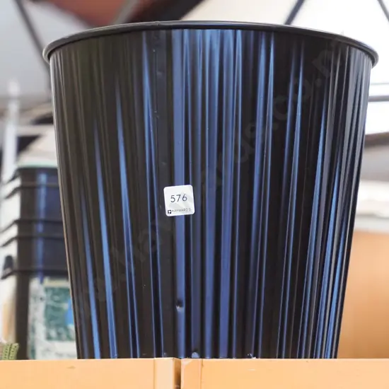 black metal waste paper bin