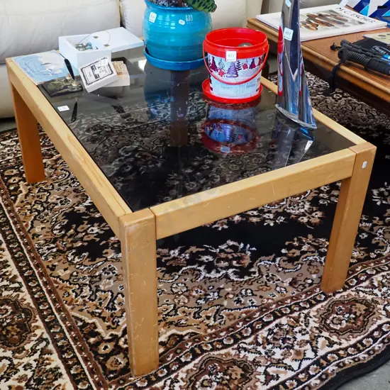 rimu and smoked glass top coffee table H-450 W-930 D-630