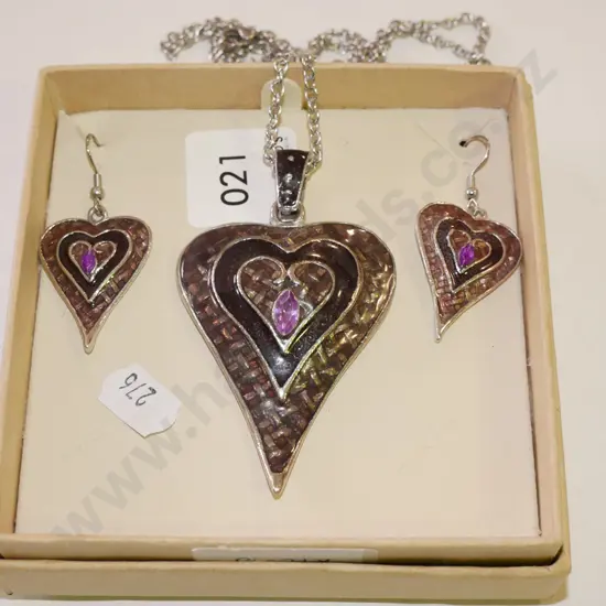 heart shaped earrings and pendant
