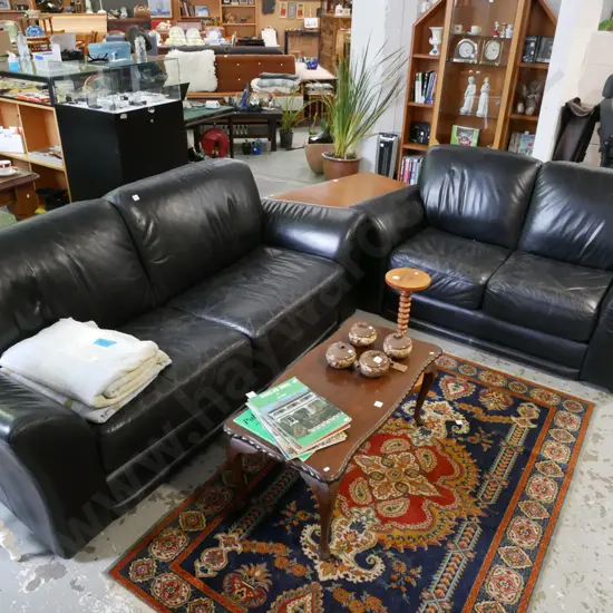 2 piece black leather lounge suite - 3 seater and 2 seater- some wear to leather