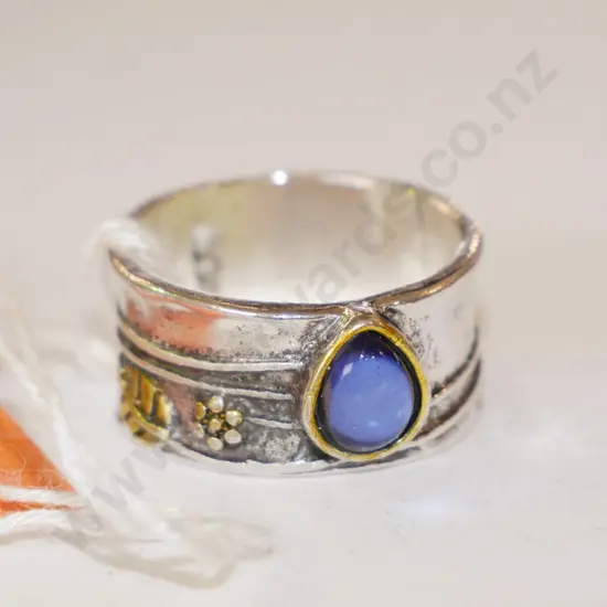 silver ring with blue stone