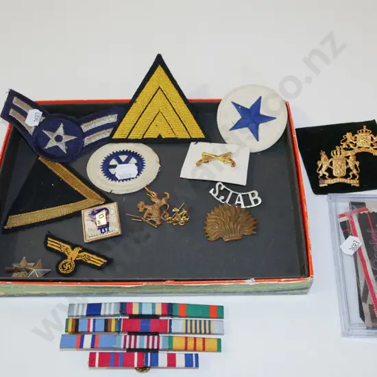 tray; various military badges, lapels etc