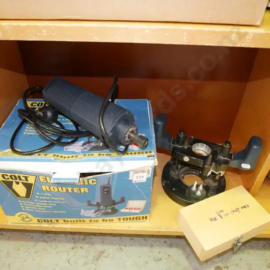 Colt router with boxed router bits