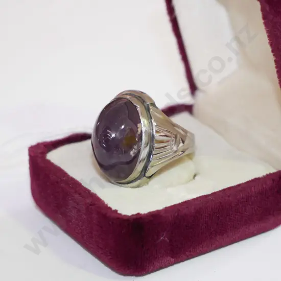 silver dress ring with purple stone