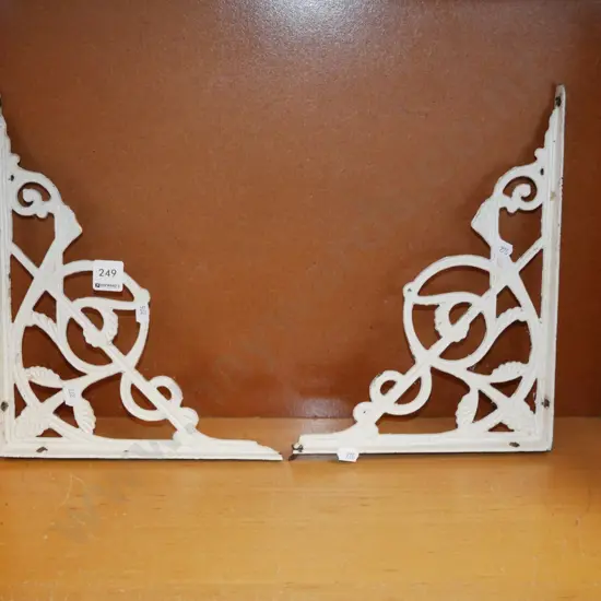 pair of cast iron ornate shelf brackets