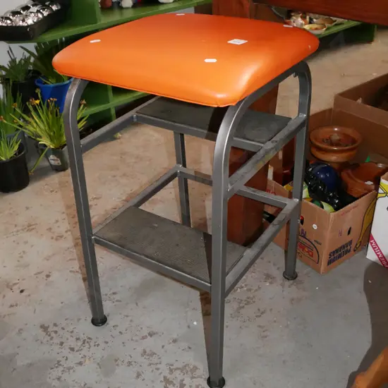 orange vinyl upholstered kitchen step stool