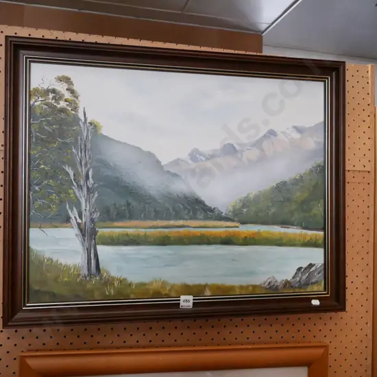 framed oil - lake and mountain scene