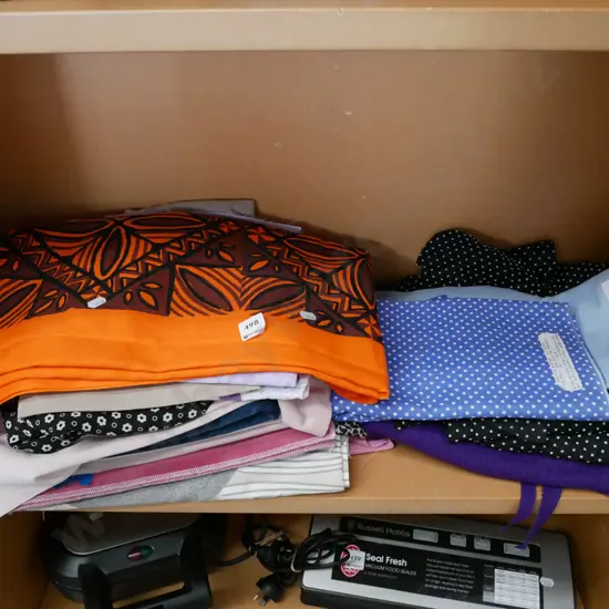 shelf of fabric pieces