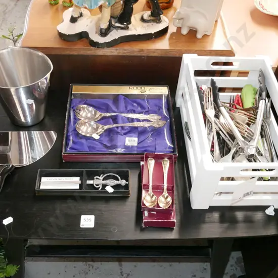 cutlery, jug, letter opener, wooden crate with tongs, forks etc