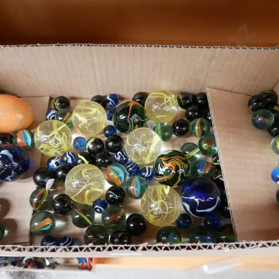 box; marbles, stone egg