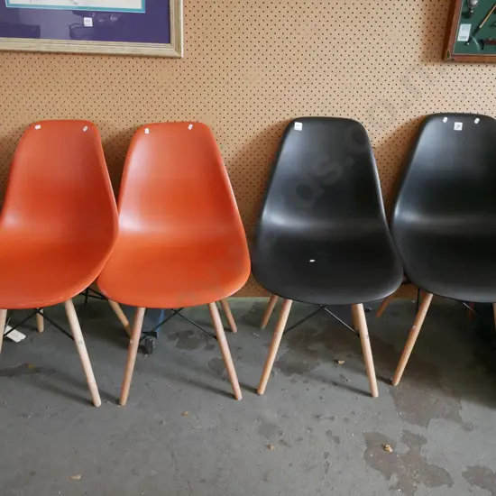 4x plastic dining chairs - 2x orange 2x black