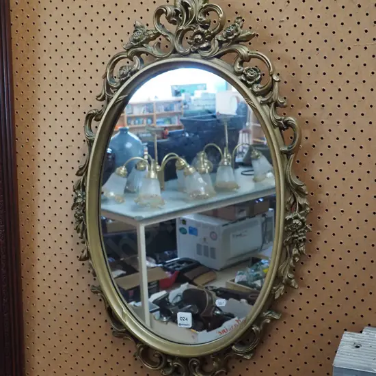 ornate framed mirror