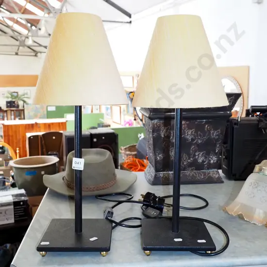pair of metal based bedside lamps