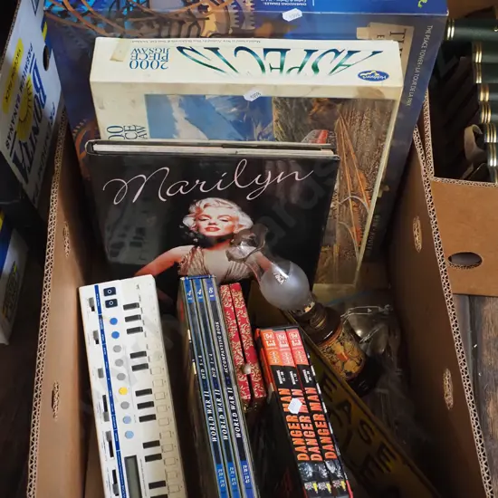 box; puzzles, DVDs, small Casio keyboard etc