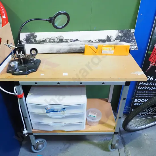 craft table on casters with plastic drawers, mitre box, soldering iron station