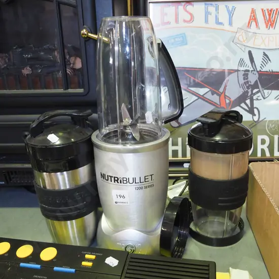 Nutri Bullet with additional canisters