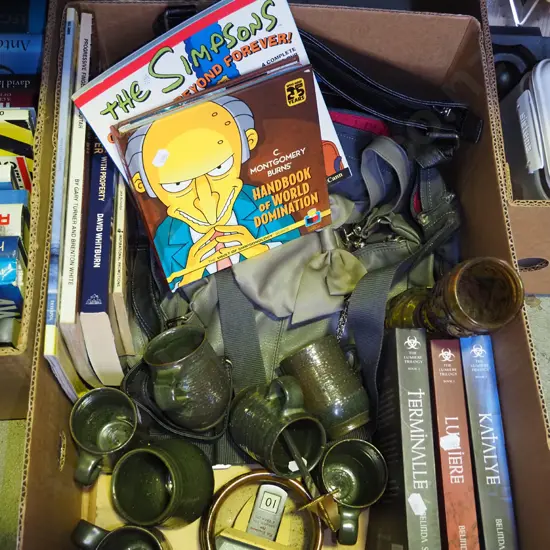 box; calendar, books, pottery coffee mugs etc