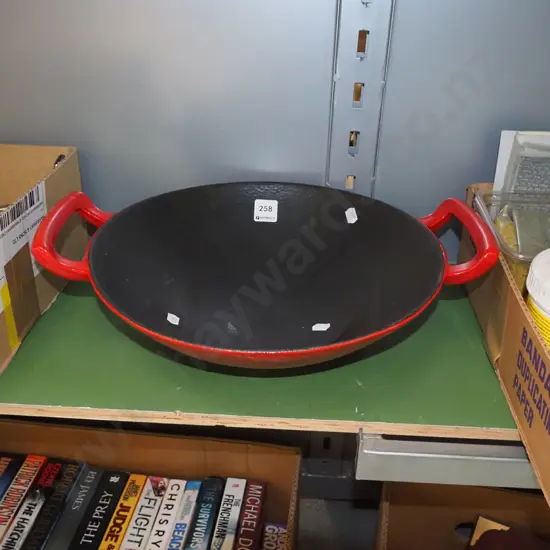 heavy cast iron and enamel wok