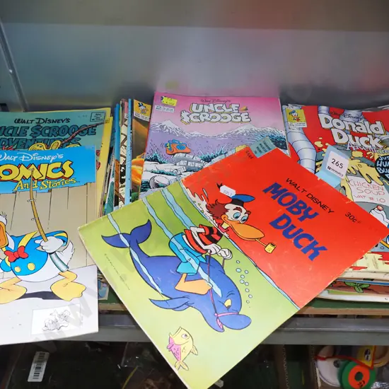 2x stacks of Donald Duck comic books