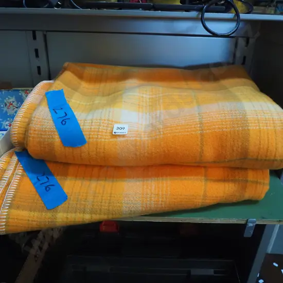 2x orange checked woollen blankets