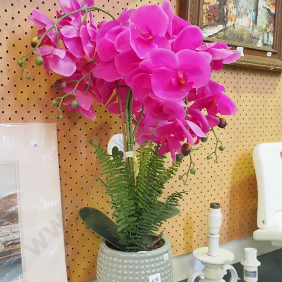 plastic orchids in jardiniere