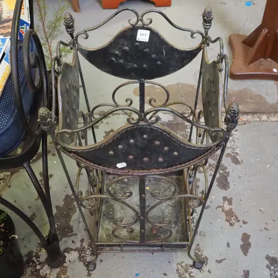 wrought metal umbrella stand - some rust and tarnishing