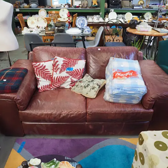 red leather 2 seater settee - some wear