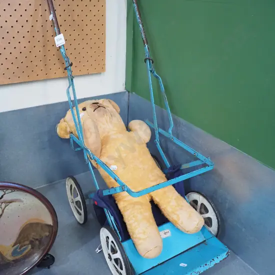 vintage dolls pram, teddy bear