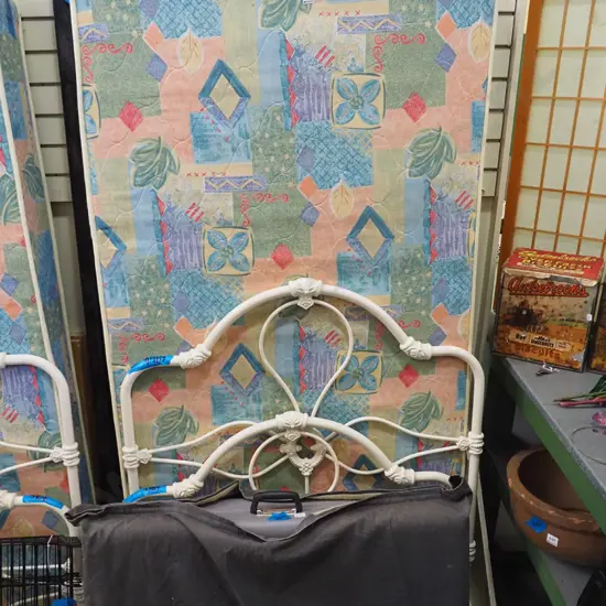 single slat bed base, mattress and wrought metal bed ends