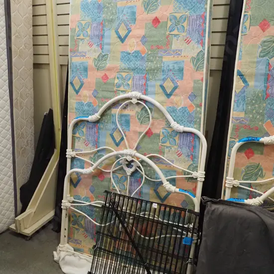 single slat bed base, mattress and wrought metal bed ends