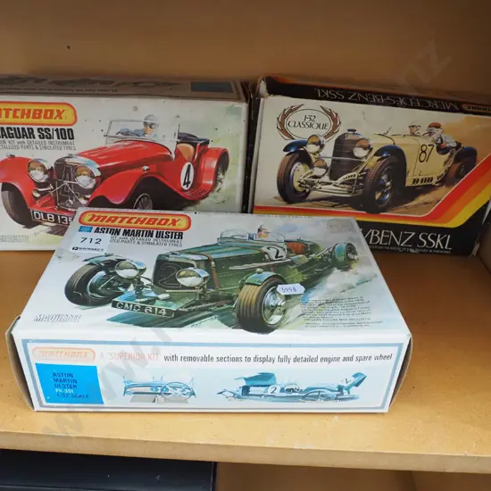 3x yet to be assembled model vehicles