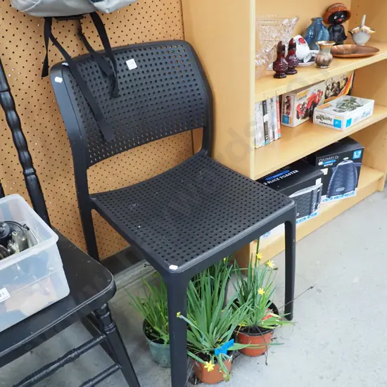 black plastic chair