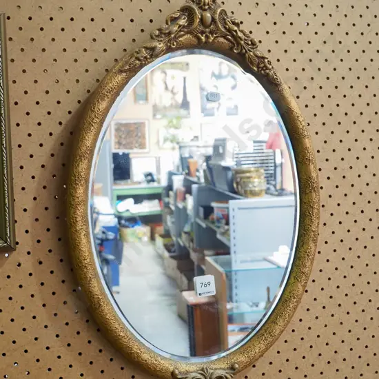 oval gilt framed wall mirror H-510 W-440