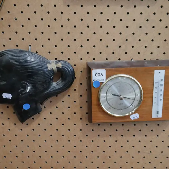 female silhouette, barometer/thermometer