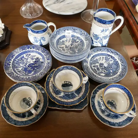 willow patterned jugs, trios, cups, saucers, bowls