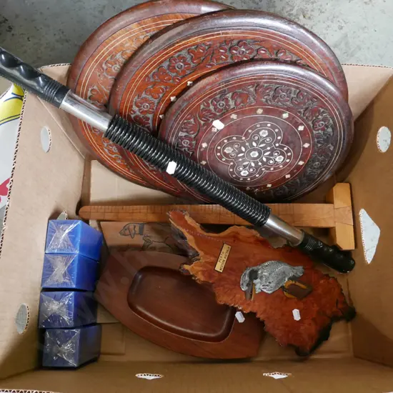 box; carved Middle Eastern circular table tops, exercise bar, candles etc