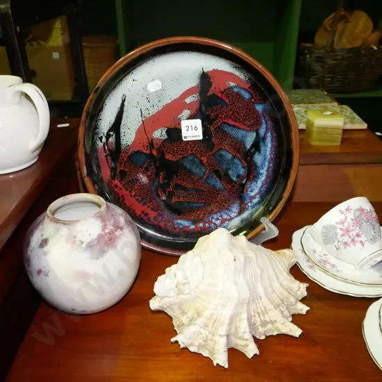studio pottery plate, vase, sea shell