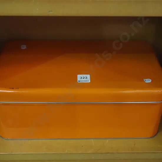 orange metal bread bin