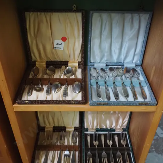 2x shelves of cased cutlery - red dots