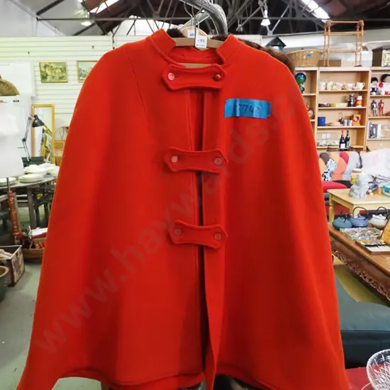red woollen cape