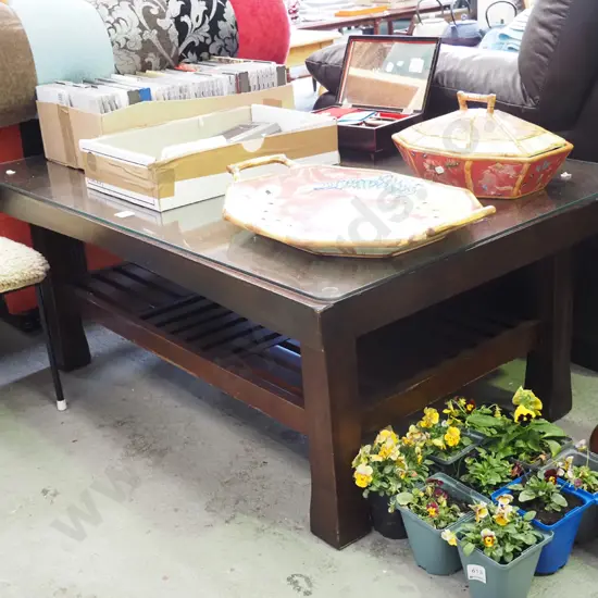 dark stained wooden coffee table with glass top H-440 W-1070 D-720