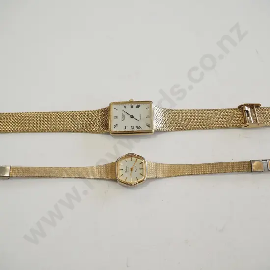 2x golden wristwatches