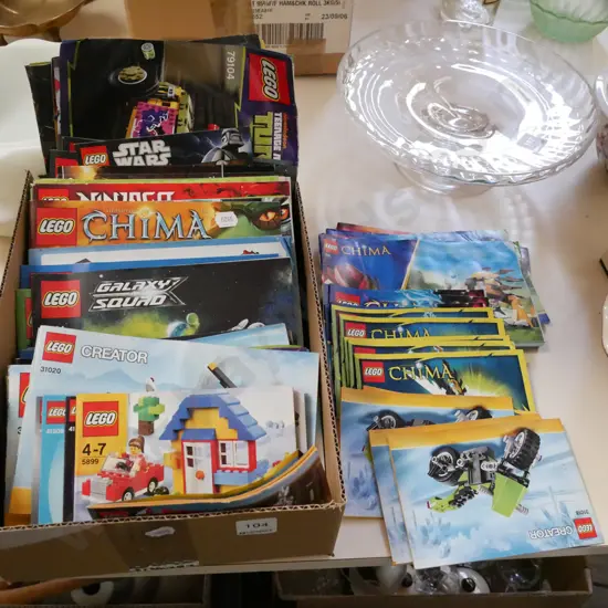 box of Lego manuals