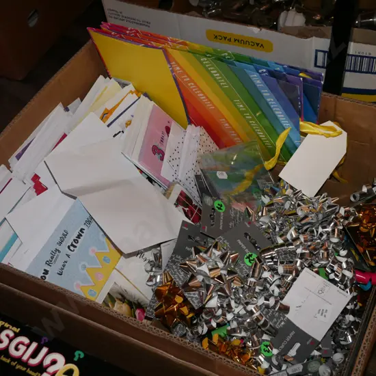 box of greeting cards, ribbons, gift bags