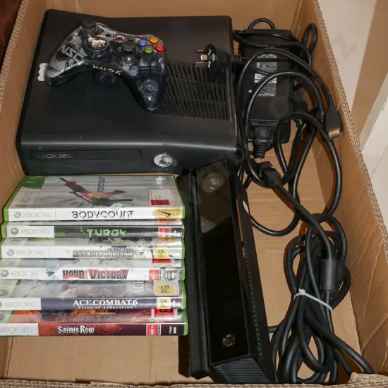 x-box 360 with controllers and games